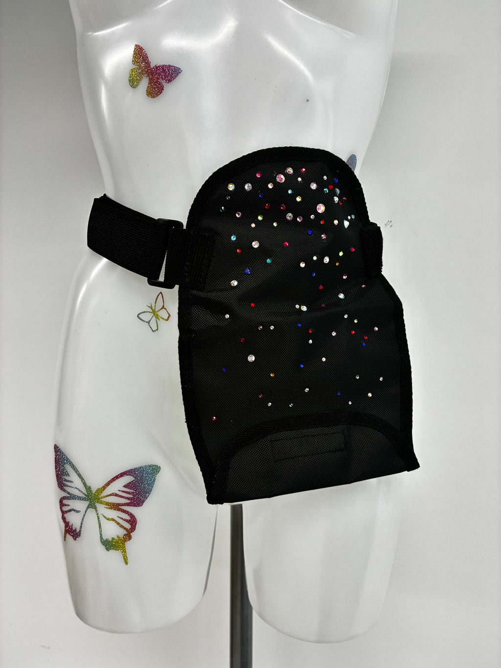 Stoma bag cover with crystals.