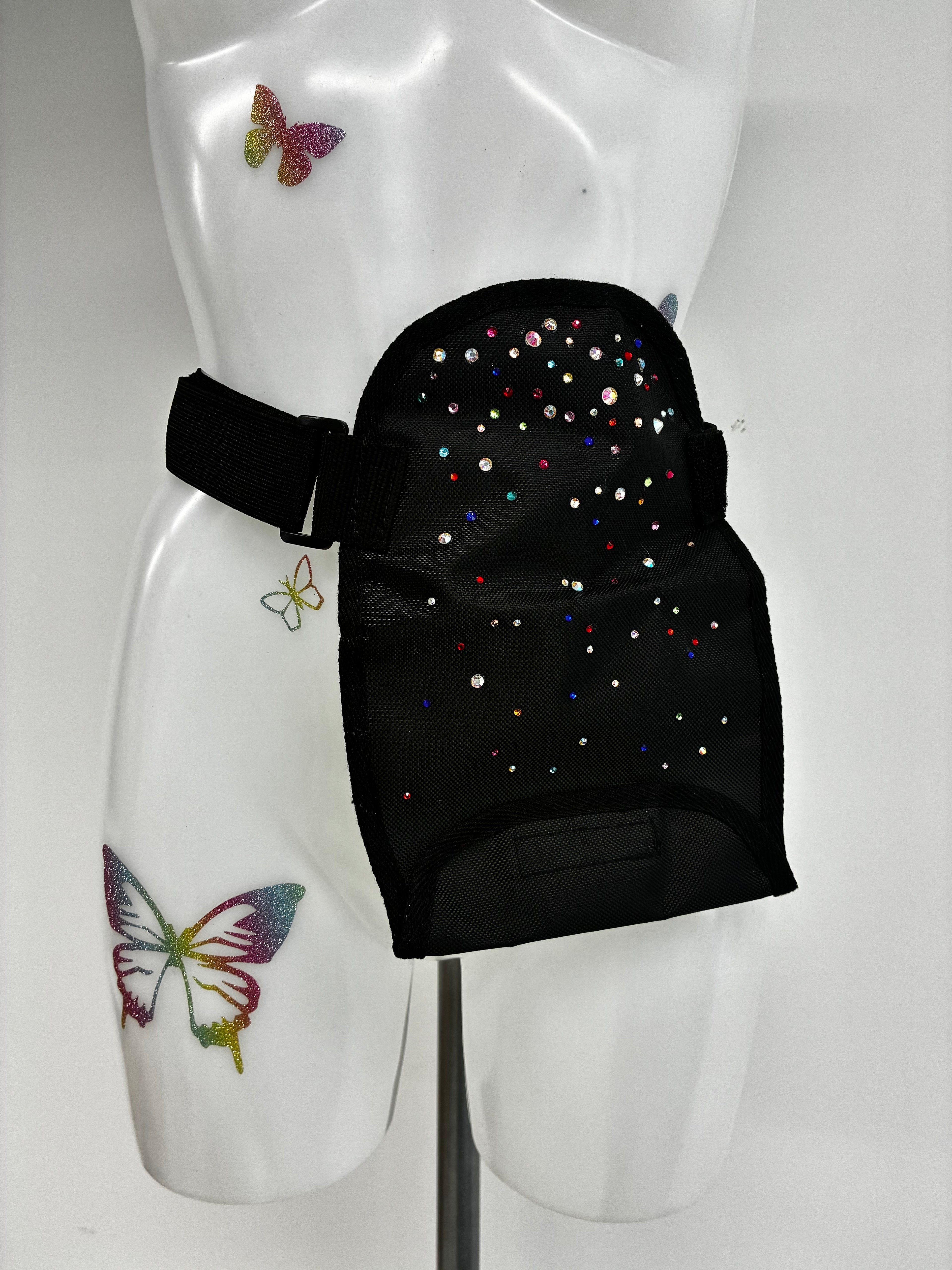 Stoma bag cover with crystals.