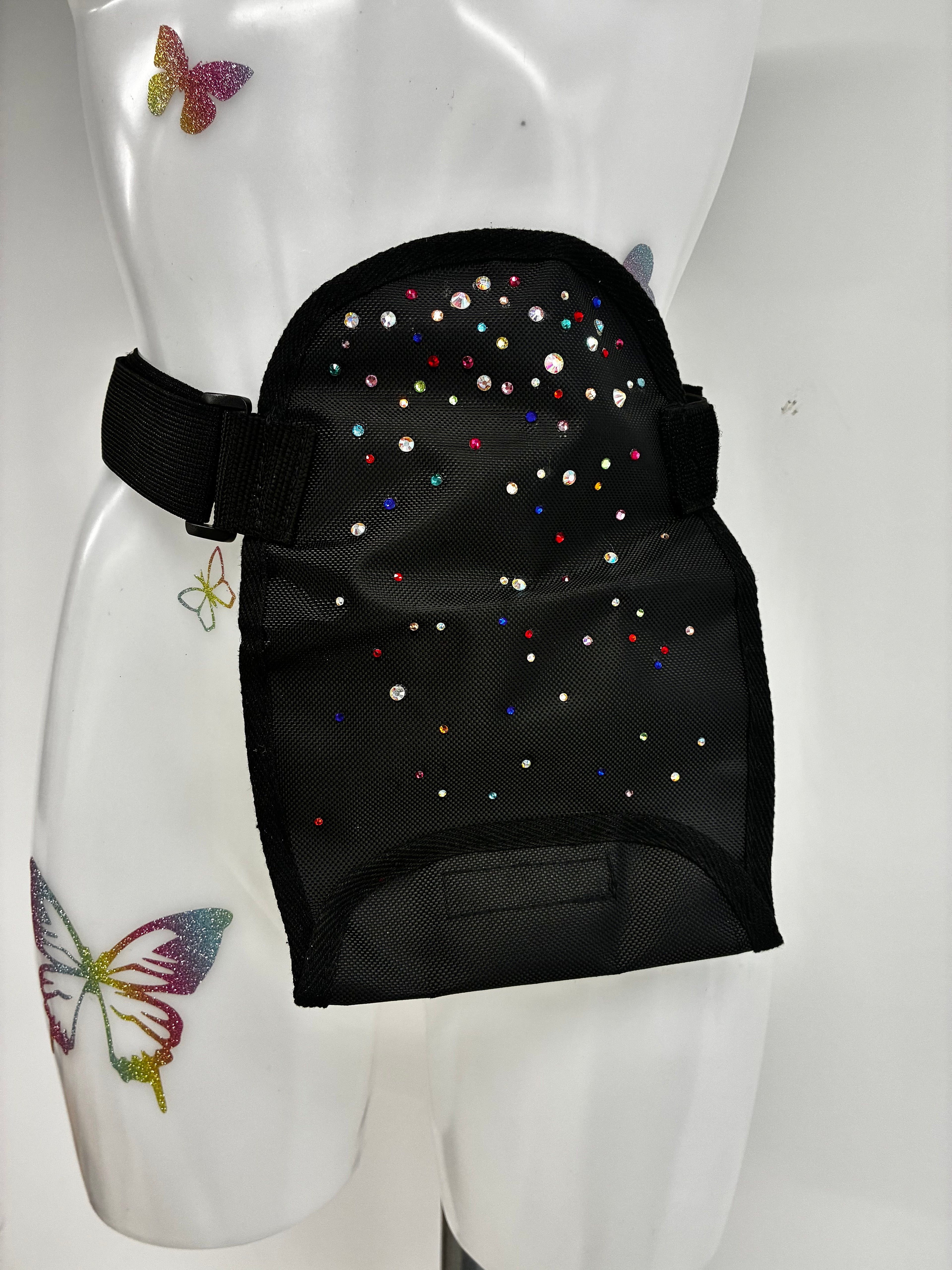 Stoma bag cover with crystals.