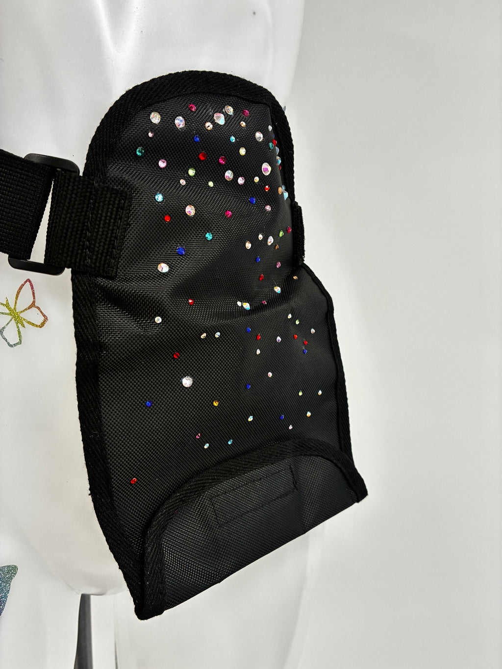 Stoma bag cover with crystals.