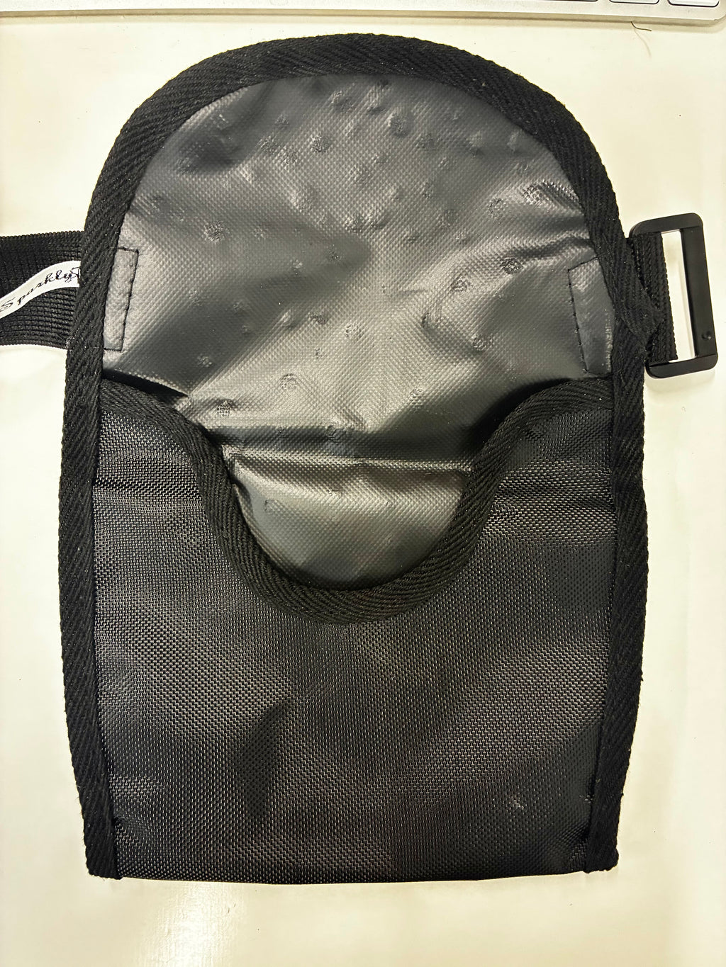 Stoma bag cover with crystals.