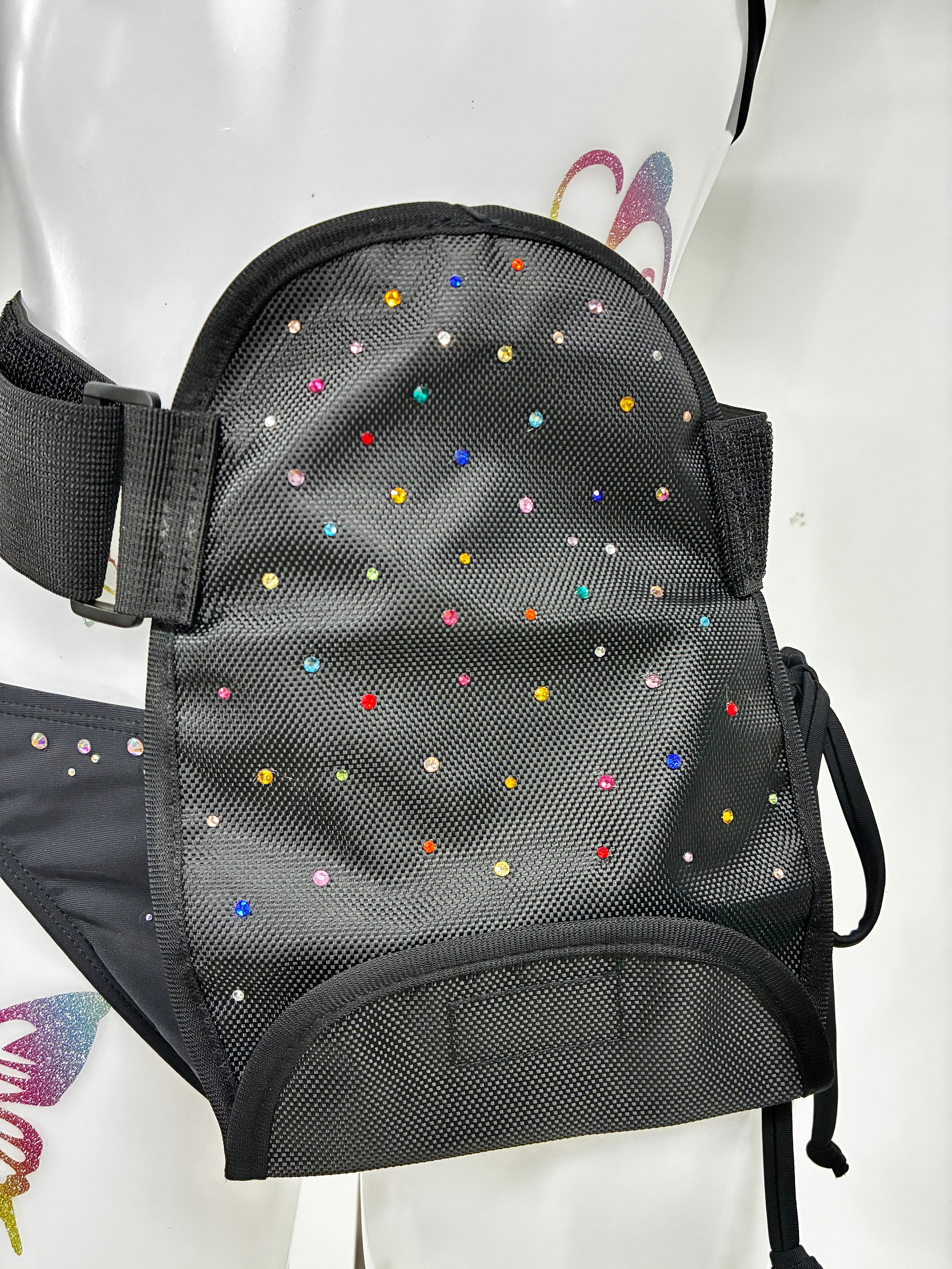 Stoma bag cover with crystals.