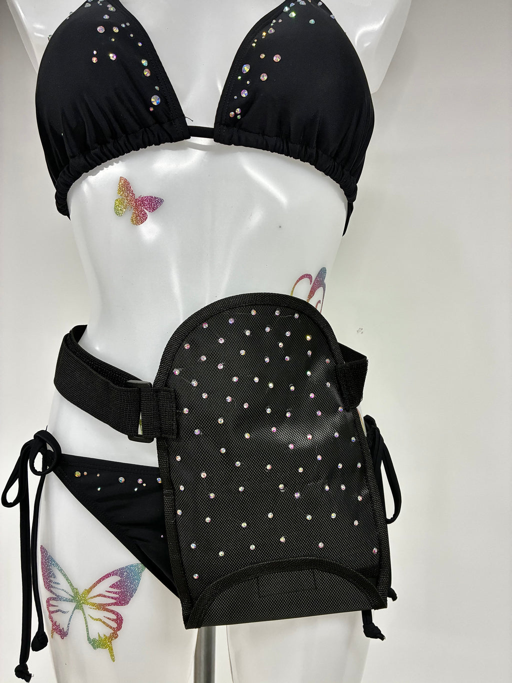 Stoma bag cover with crystals.