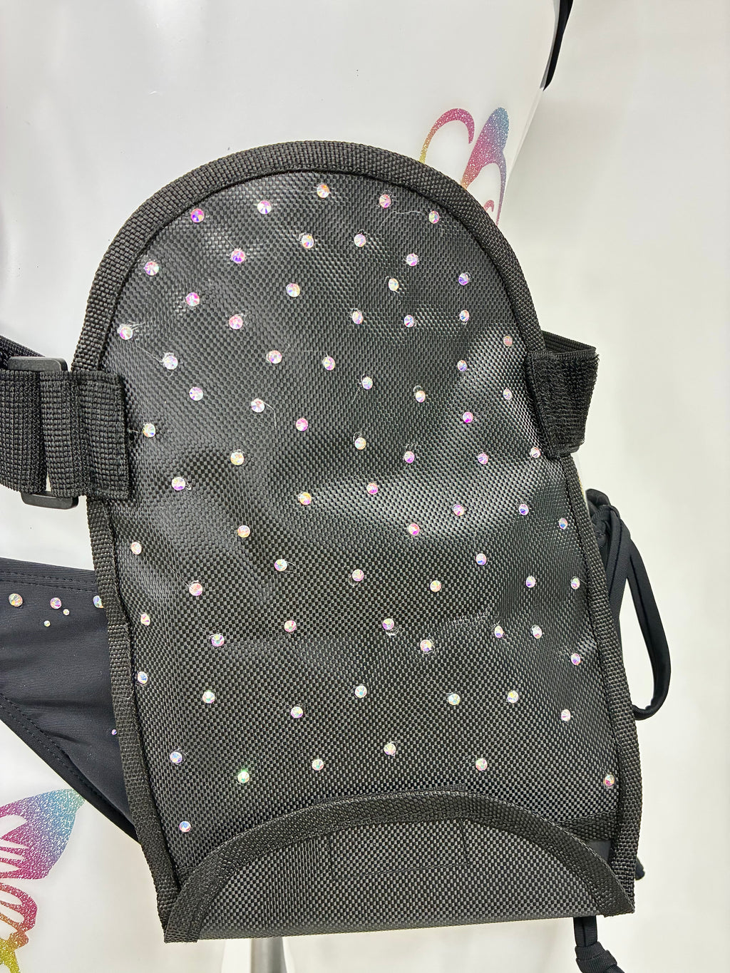 Stoma bag cover with crystals.