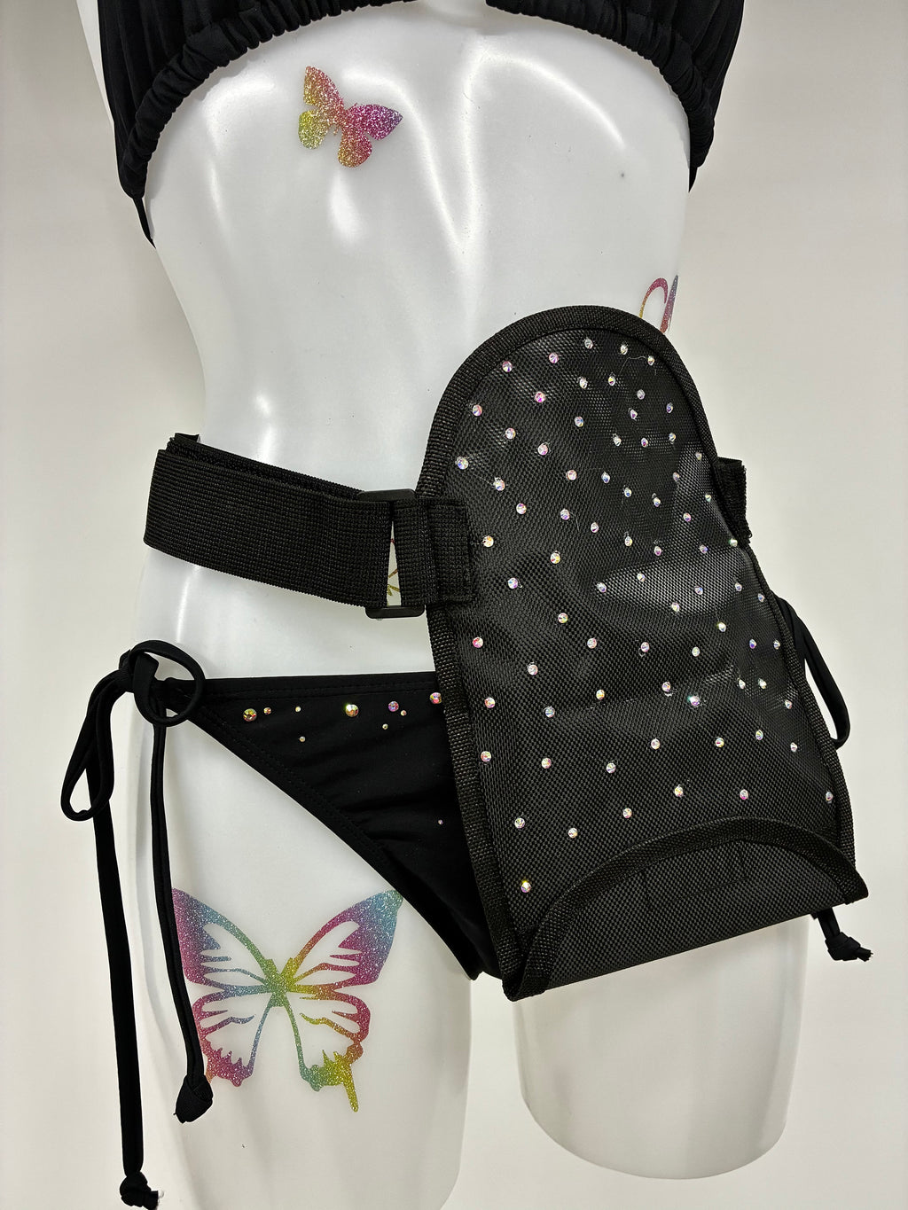 Stoma bag cover with crystals.